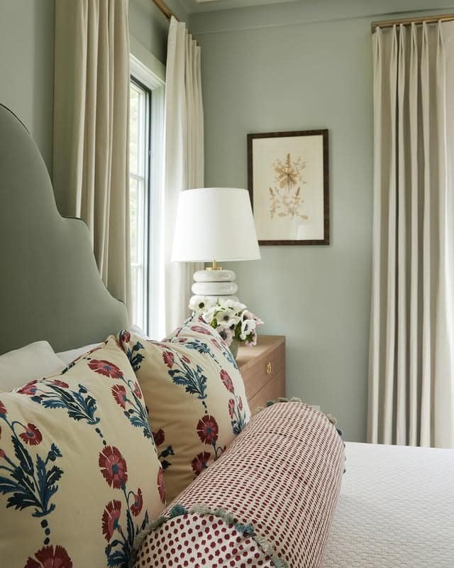 4. Patterned Sophistication with Botanical Accents - teal and white bedroom ideas