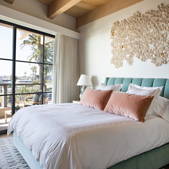18. Soft Teal Elegance with Peach Accents - teal and white bedroom ideas