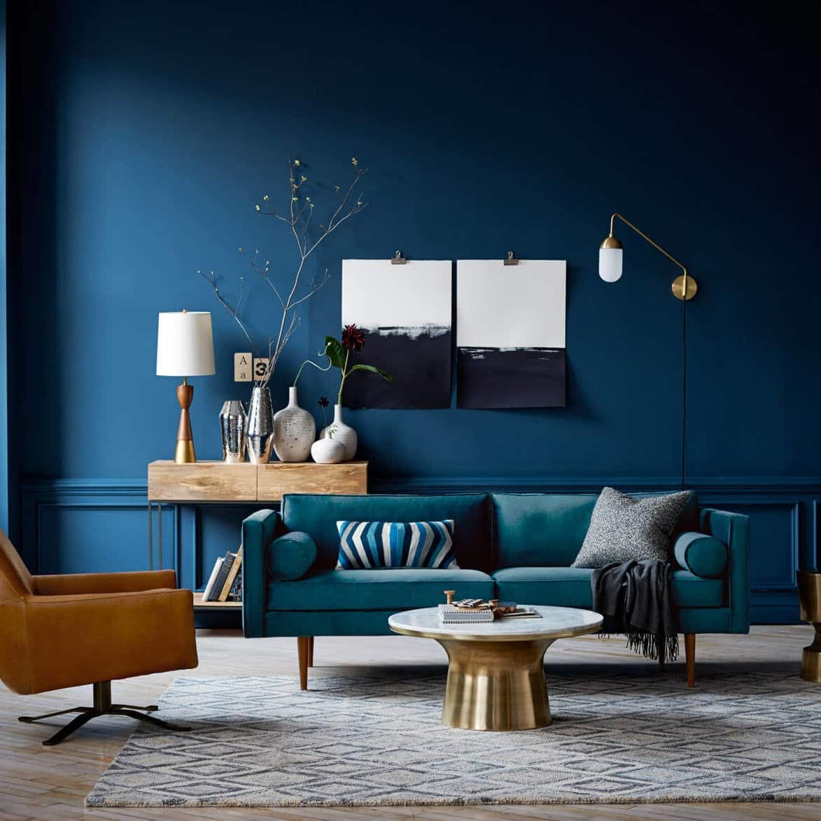 5. Deep Blue Statement with Mid-Century Warmth - blue and gold living room ideas