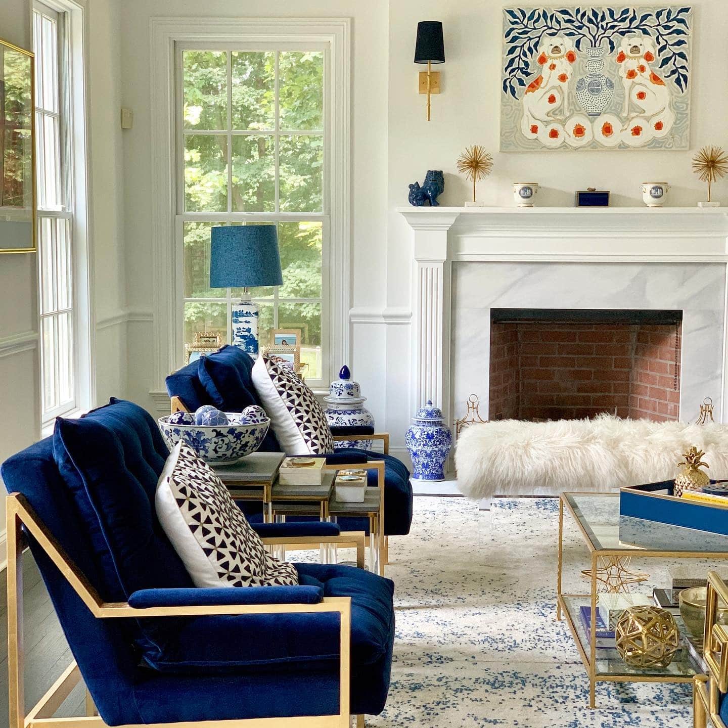 14. Chinoiserie Charm with a Modern Twist - blue and gold living room ideas