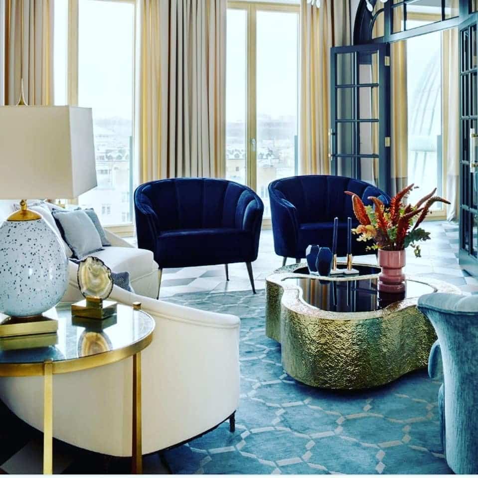 19. Contemporary Glam with Sculptural Gold - blue and gold living room ideas