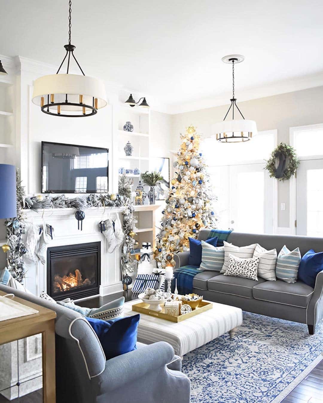 20. Winter Elegance in Blue and Silver-Gold Accents - blue and gold living room ideas