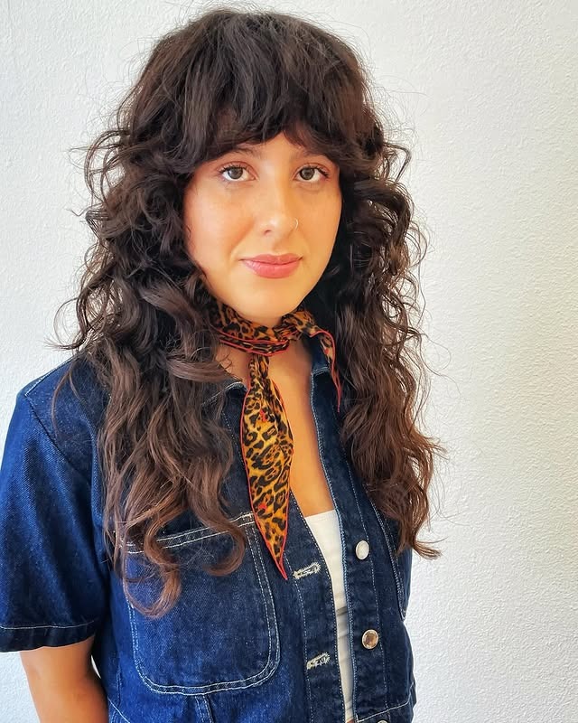 12. Curly Espresso Shag with Full Fringe - Short Shag Haircuts