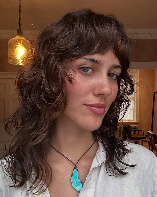 17. Medium Shag with Effortless Curls - Short Shag Haircuts