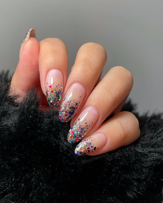 5. Confetti Spark – Multicolor Glitter Gradient Nails - new years eve nail ideas