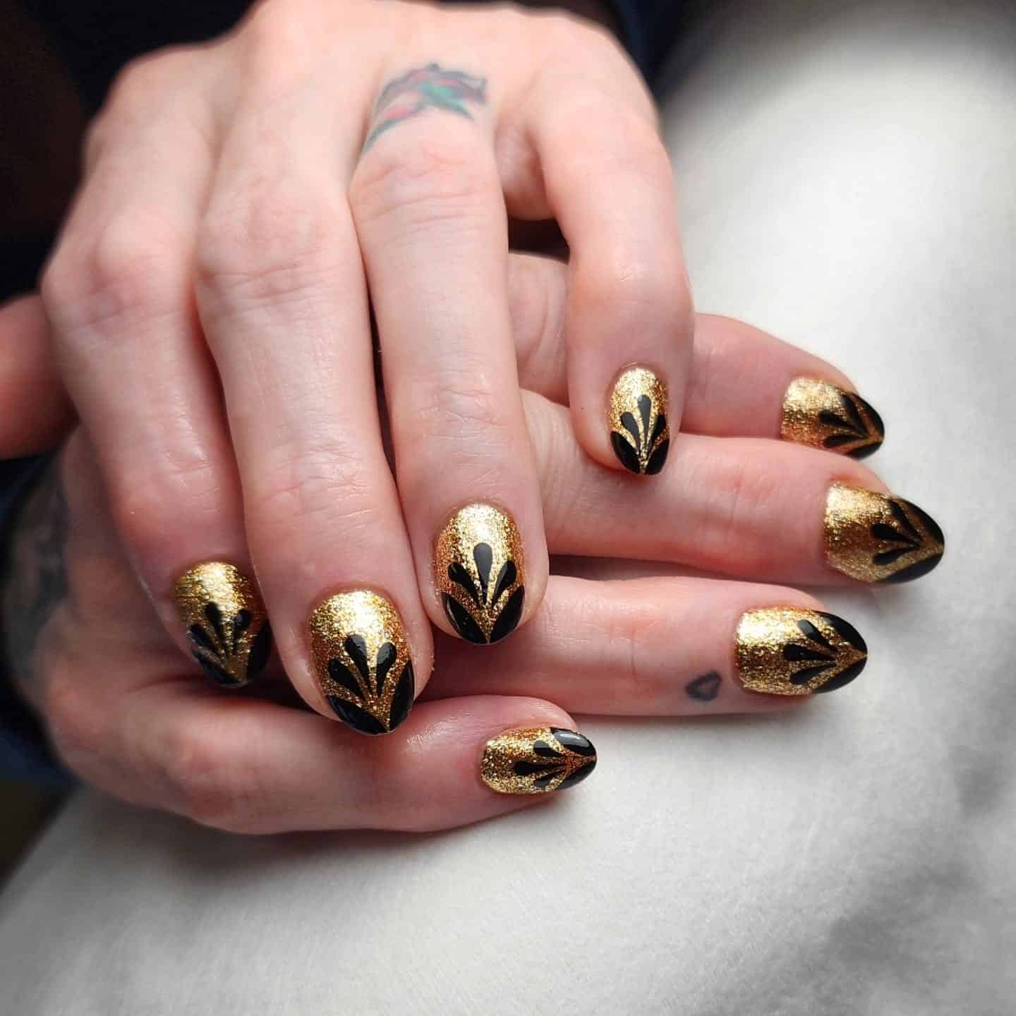 14. Art Deco Spark – Black and Gold Glitter Nails - new years eve nail ideas