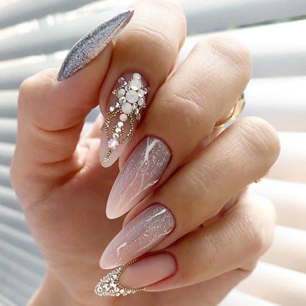 18. Opal Radiance – Nude and Pearl Embellished Nails - new years eve nail ideas
