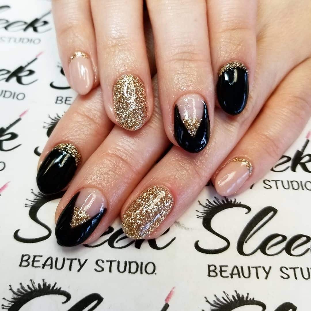 19. Golden Midnight – Black and Gold Party Nails - new years eve nail ideas
