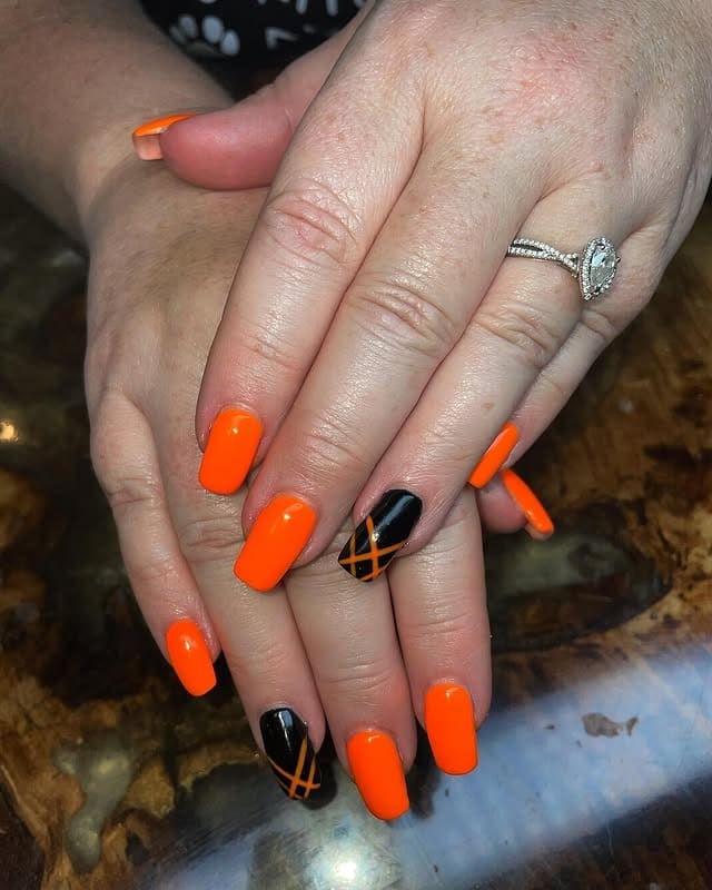 11. Pumpkin Patch Plaid - orange and black nail ideas