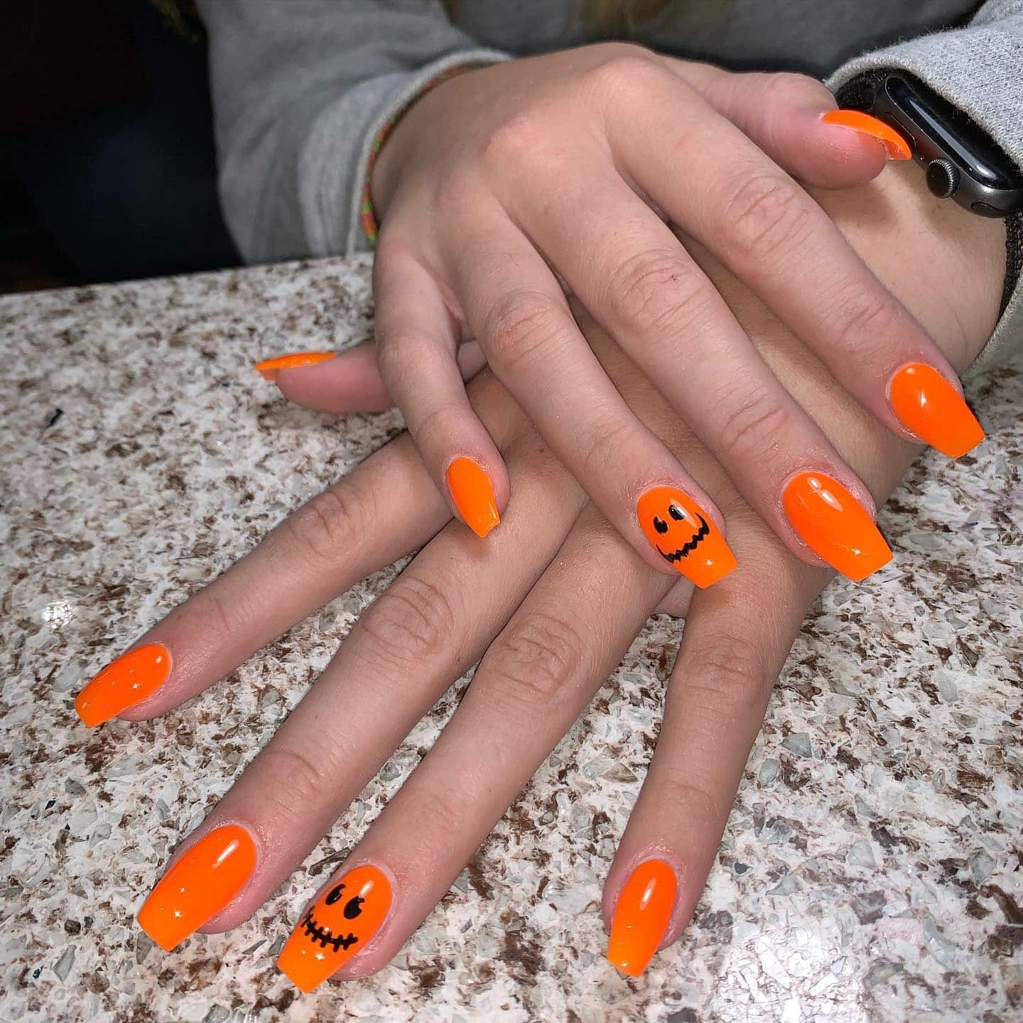 13. Jack-O’-Glow Charm - orange and black nail ideas