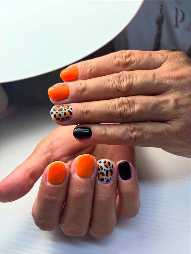 18. Autumn Leopard Blend - orange and black nail ideas
