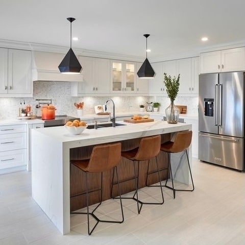 14. Modern Luxe with Walnut Accents - backsplash ideas for white kitchen