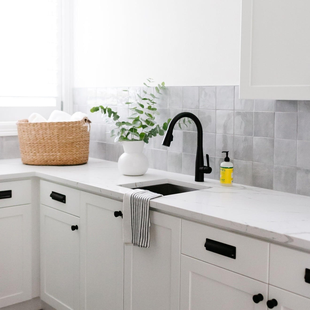 17. Subtle Gray for Everyday Elegance - backsplash ideas for white kitchen
