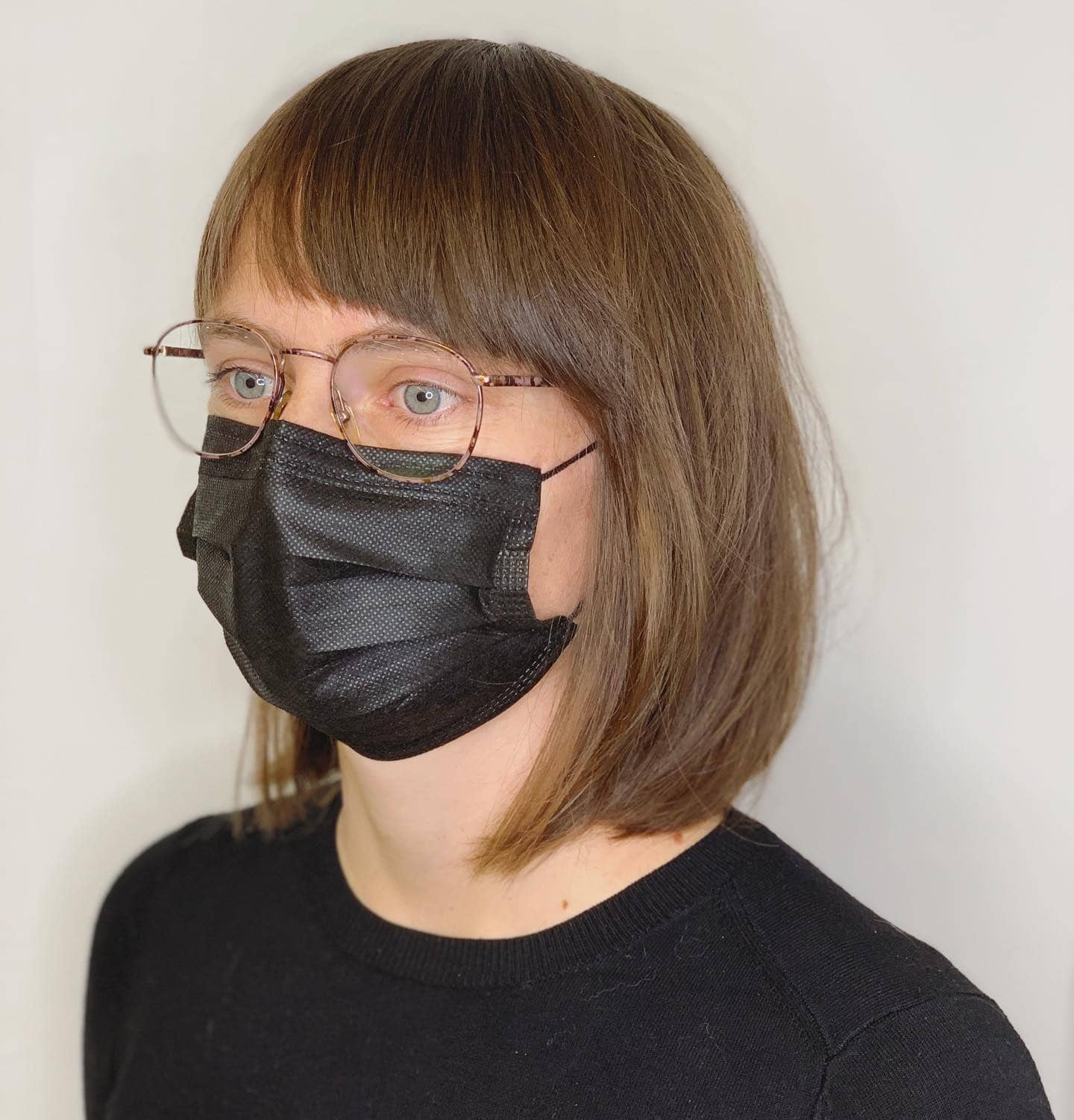 2. Soft Chestnut Lob with Rounded Fringe - Asymmetrical Bangs Hairstyles