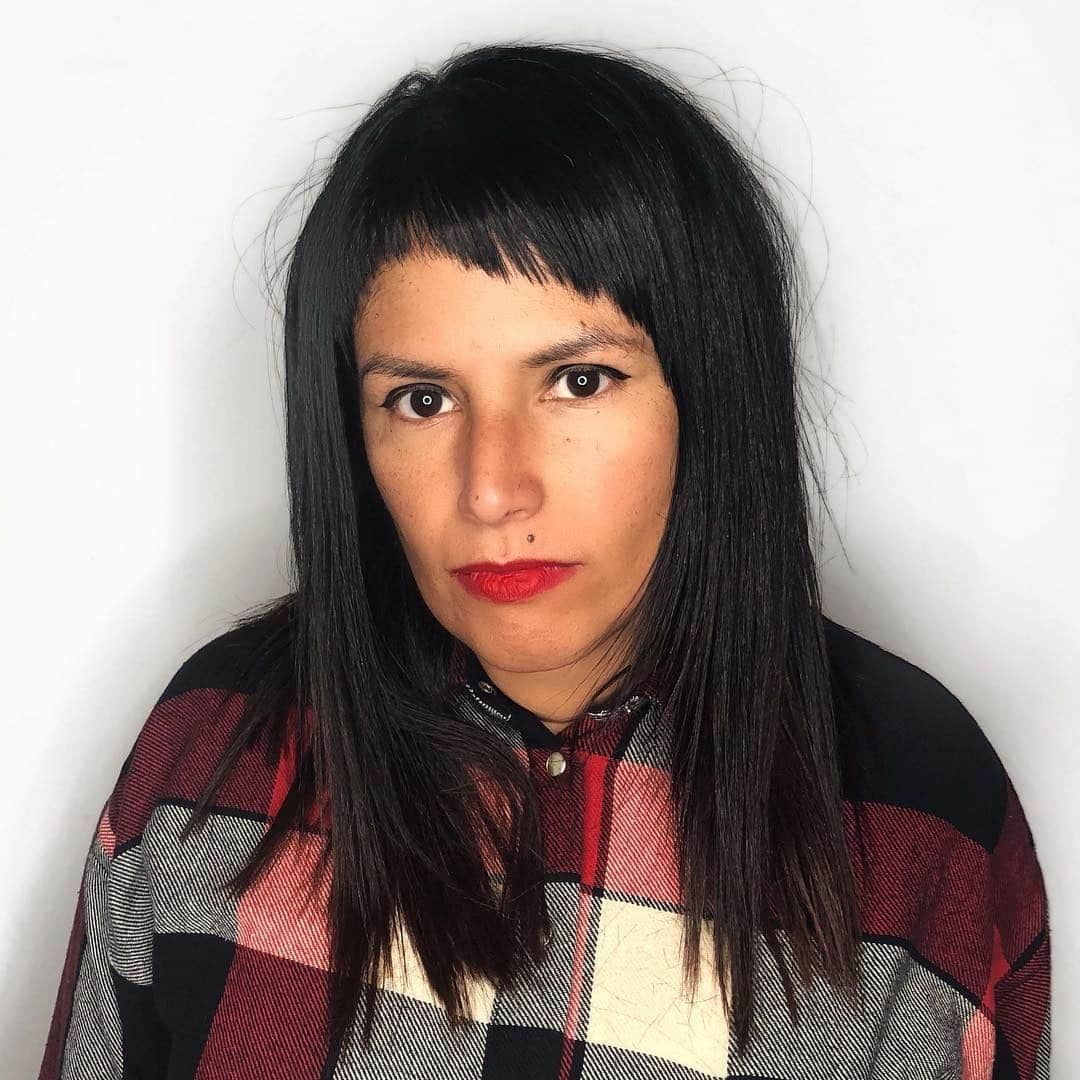 8. Inky Black Long Bob with Choppy Micro Bangs - Asymmetrical Bangs Hairstyles