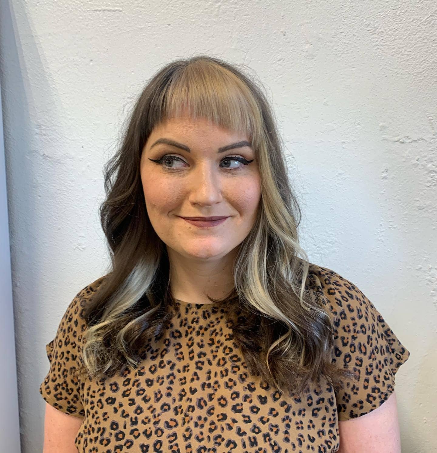 10. Honey Blonde Waves with Contrast Fringe - Asymmetrical Bangs Hairstyles