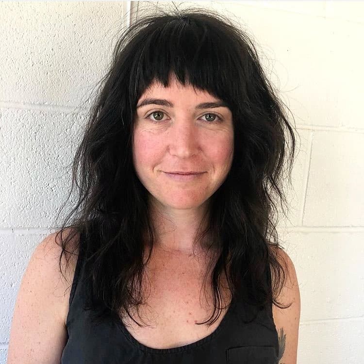 14. Midnight Shag with Soft Micro Layers - Asymmetrical Bangs Hairstyles