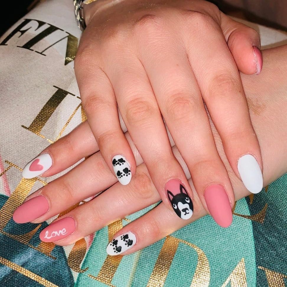 7. Pet Lover’s Pastel Story - paw print nail ideas