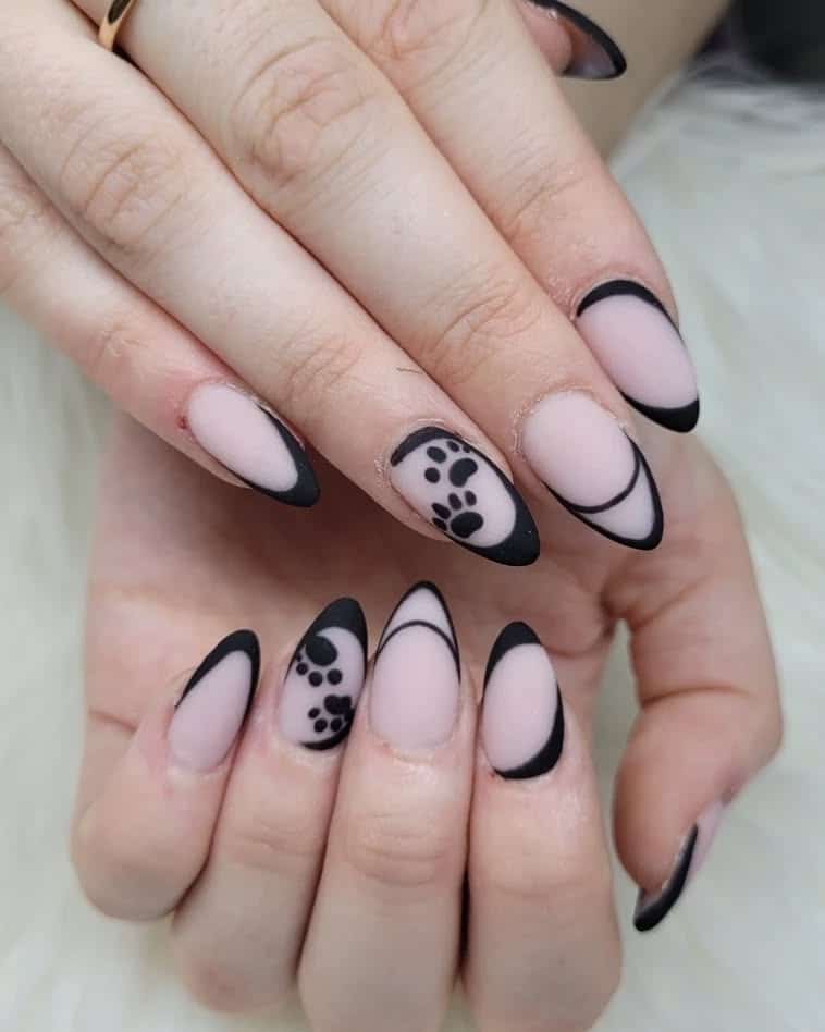 22. Matte Black Edge with Paw Art - paw print nail ideas