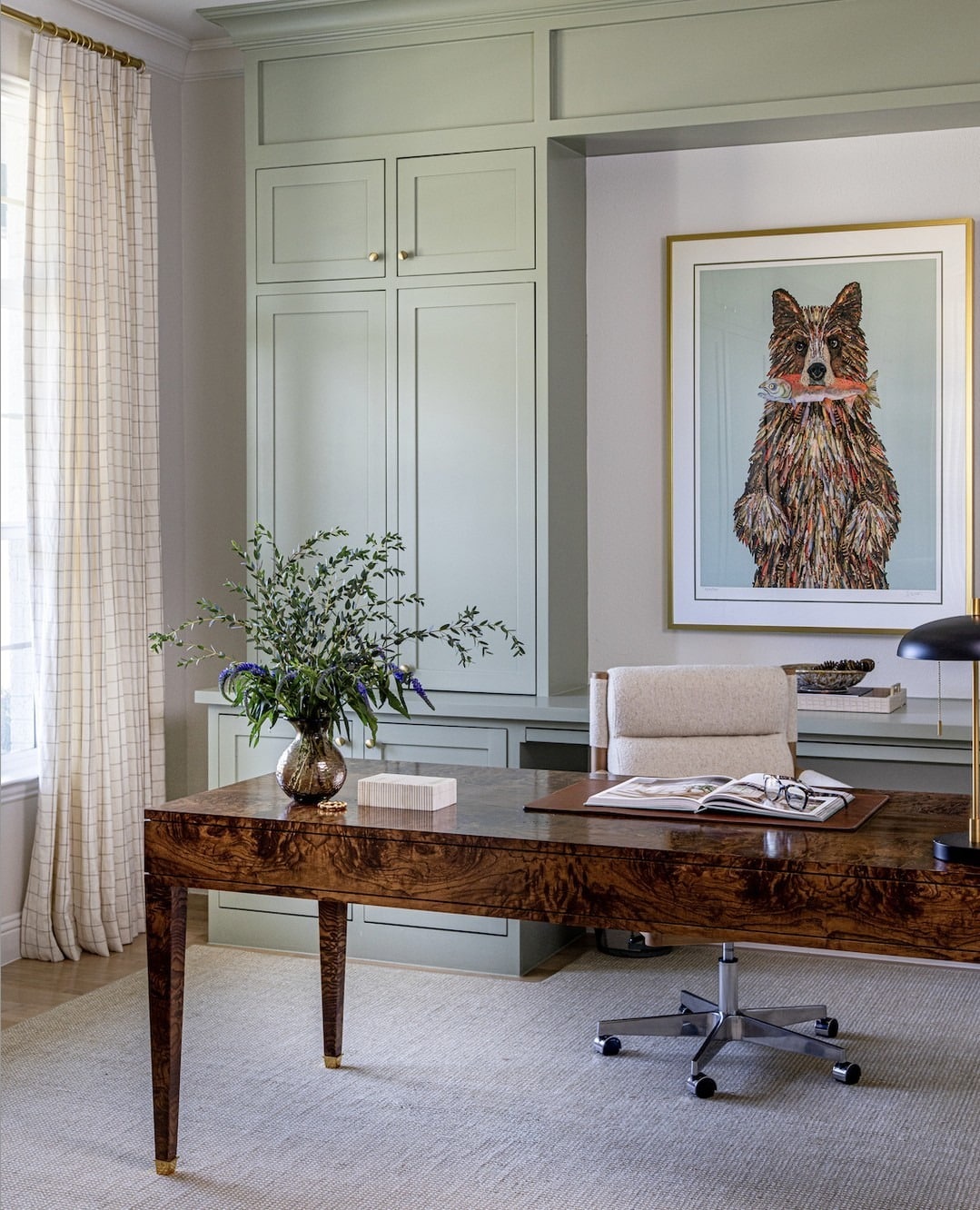 10. Refined Sage Green Study with Artistic Flair - office ideas for men