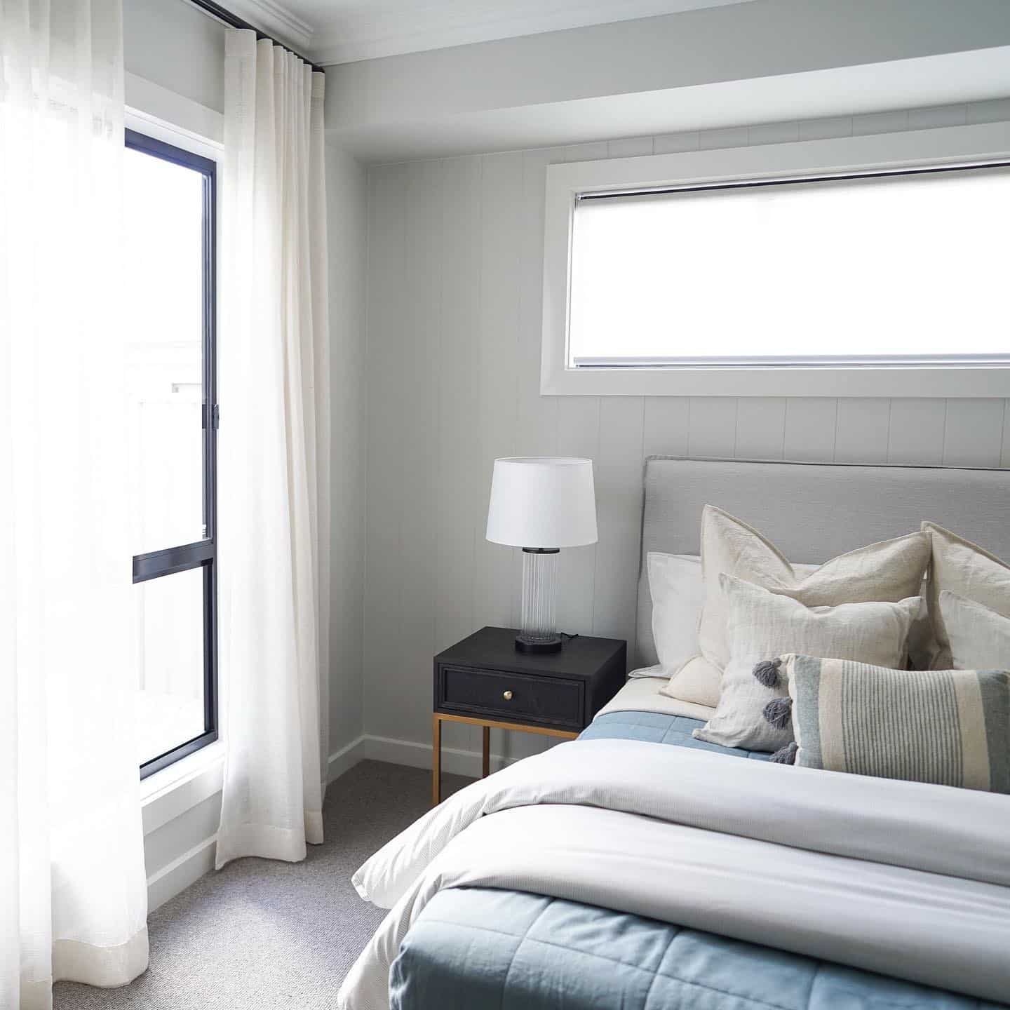 3. Airy Coastal Calm in Mist Blue - blank wall bedroom ideas