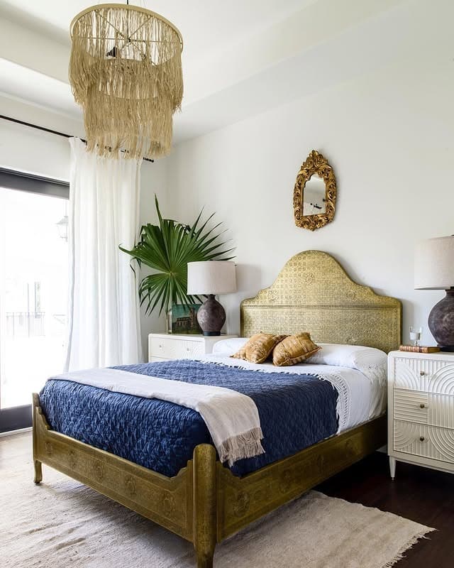11. Golden Palm Retreat with Navy Contrast - blank wall bedroom ideas