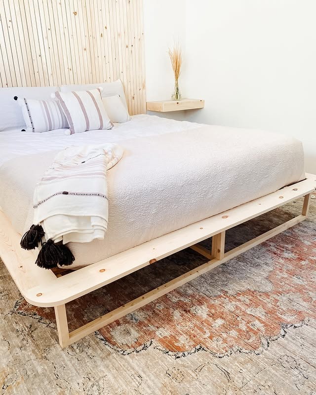 12. Scandinavian Simplicity in Natural Pine - blank wall bedroom ideas