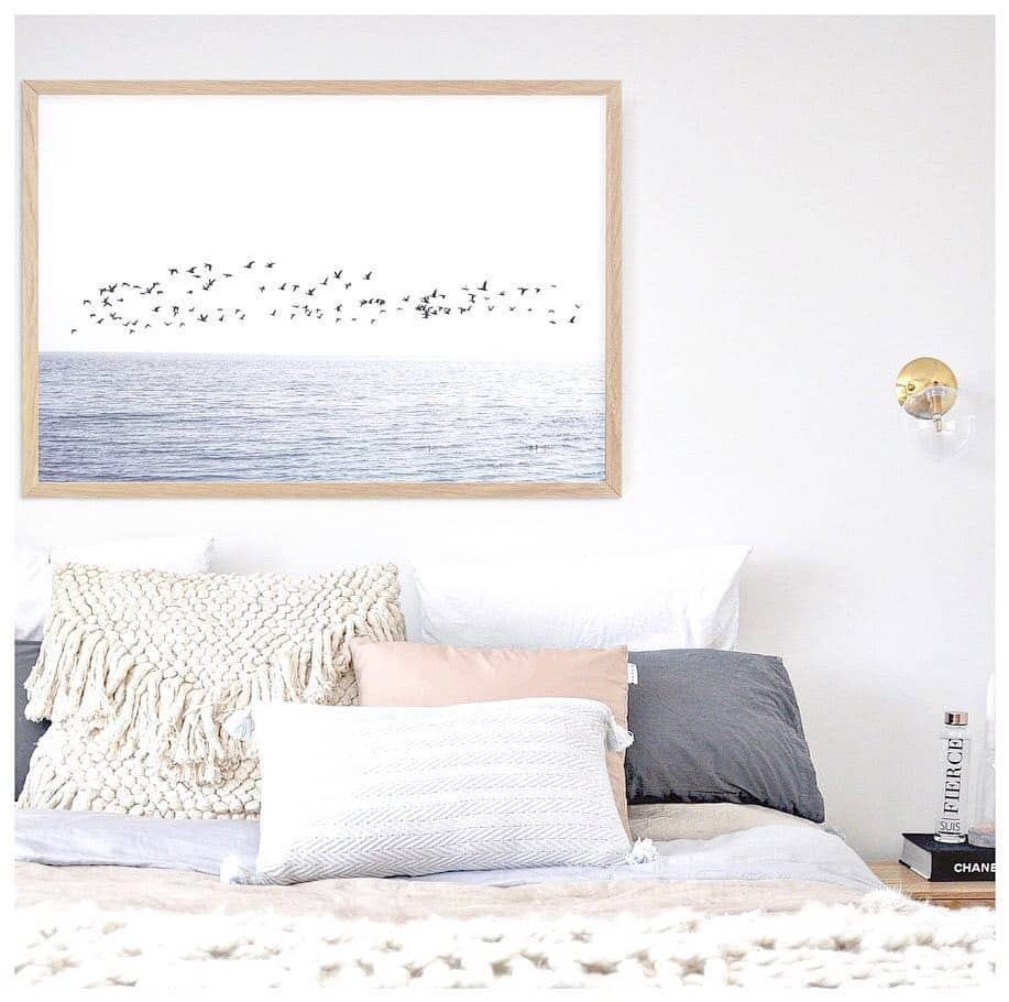 20. Coastal Softness with Natural Texture - blank wall bedroom ideas