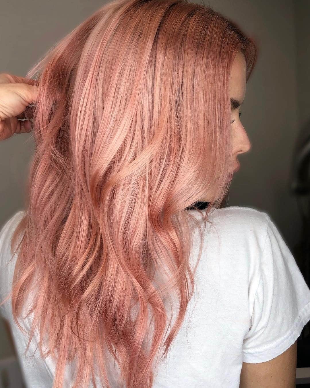 4. Peachy Rose Gold with Subtle Layers - Rose Gold Hair Color