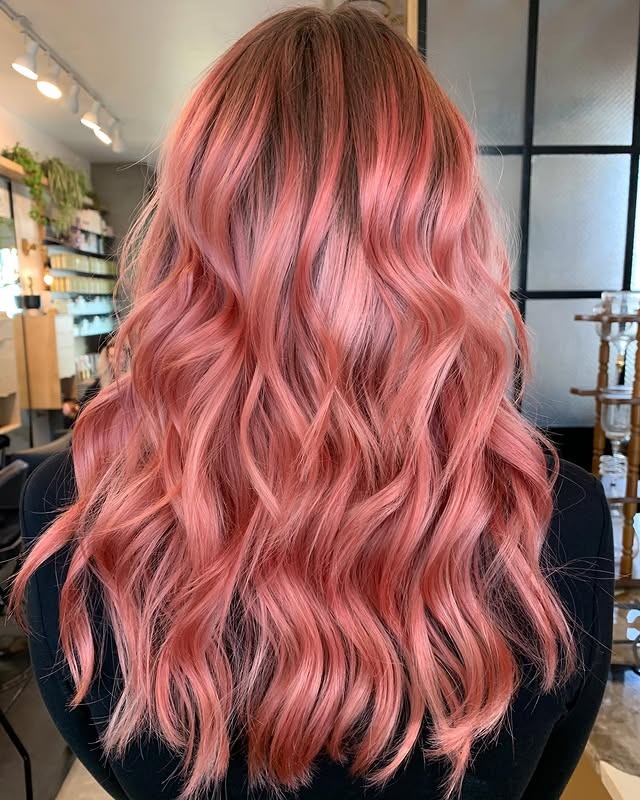 13. Vibrant Coral Rose Gold Layers - Rose Gold Hair Color