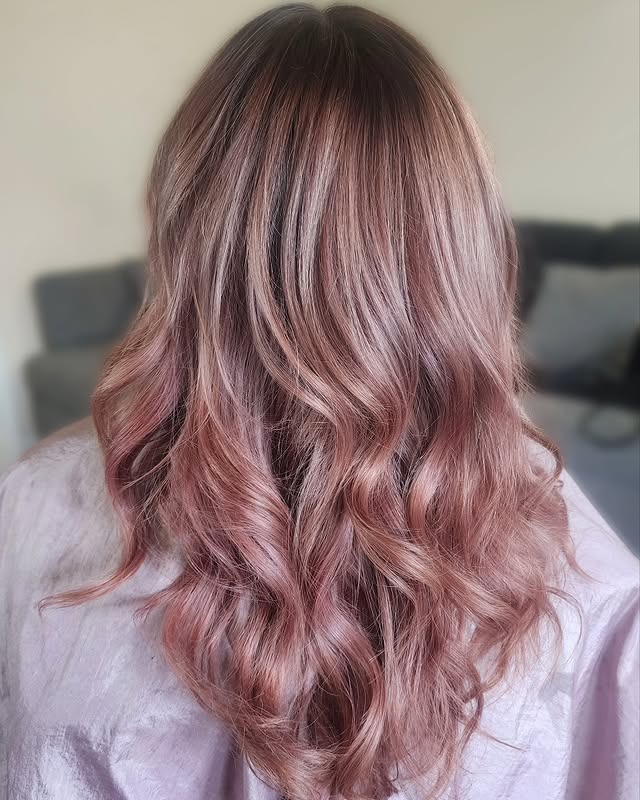 22. Muted Rose Gold Blend with Gentle Texture - Rose Gold Hair Color