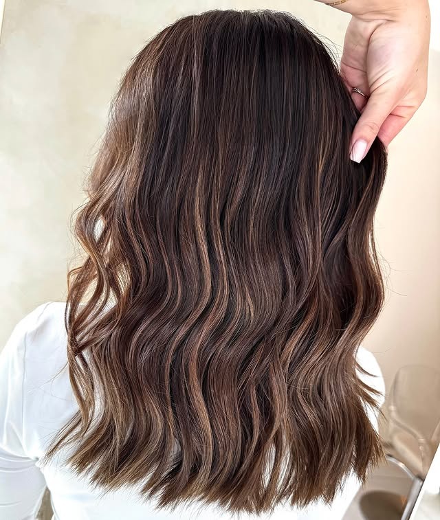 7. Cinnamon Glazed Waves - Brown Hair Color