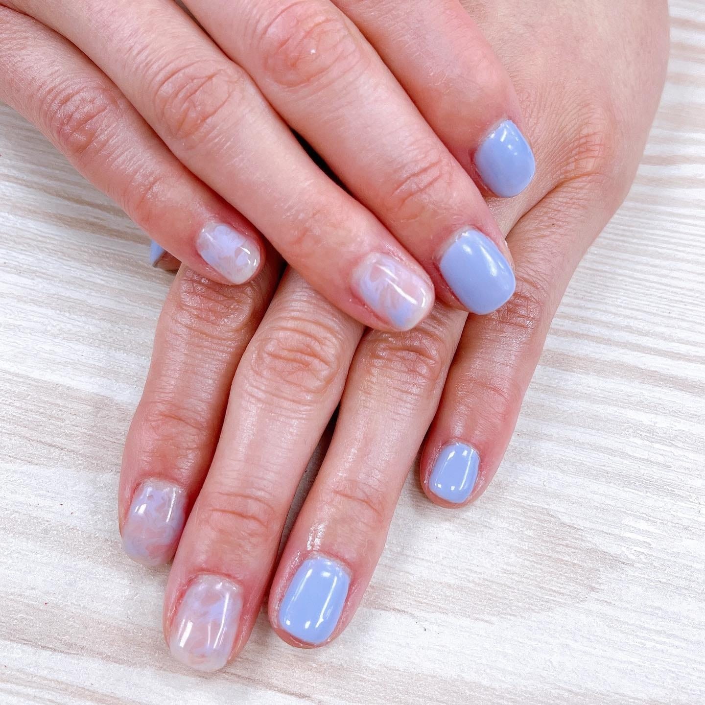 15. Milky Blue Periwinkle Marble - periwinkle nail ideas