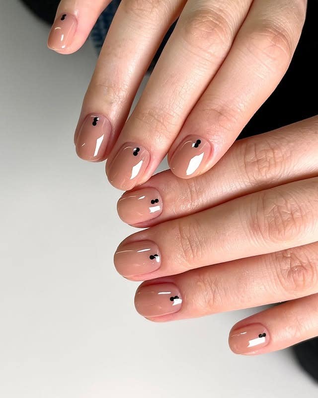 17. Minimal Nude with Black Dots - periwinkle nail ideas