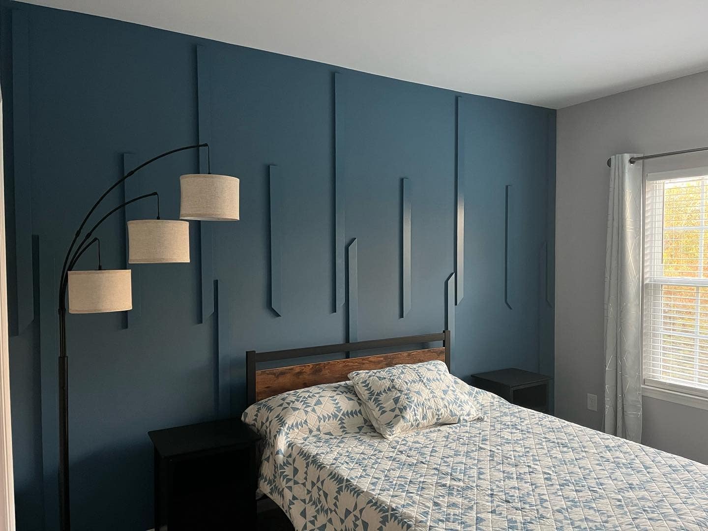 7. Contemporary Blue Geometry - blue wall bedroom ideas