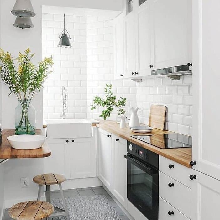 1. Scandinavian Simplicity with Natural Wood Accents - small white kitchen ideas