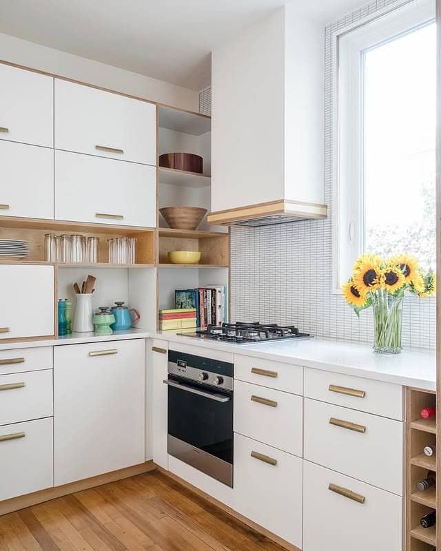 2. Modern Minimalist White Kitchen with Brass Touches - small white kitchen ideas