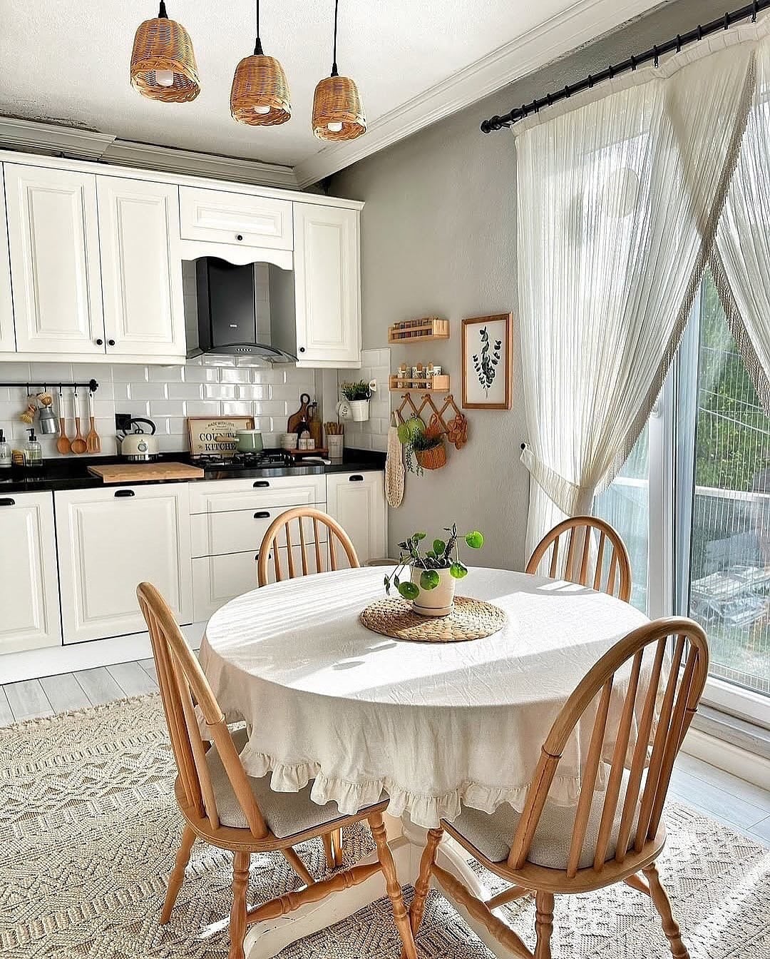 3. Country Chic White Kitchen with Cozy Charm - small white kitchen ideas
