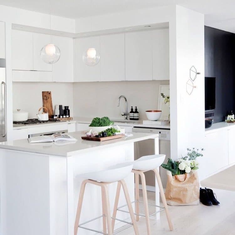 11. Crisp White Minimal Kitchen with Soft Neutrals - small white kitchen ideas