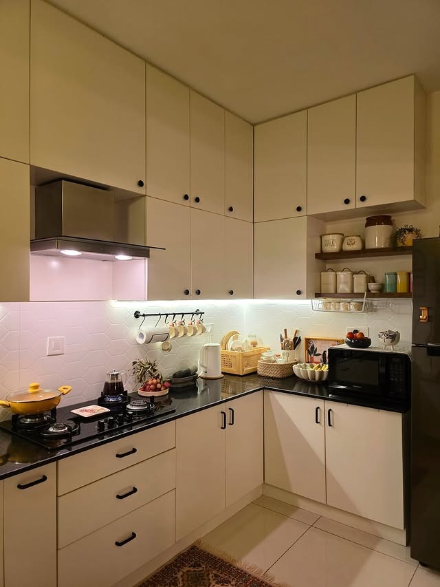 19. Cozy White Kitchen with Black Contrast - small white kitchen ideas