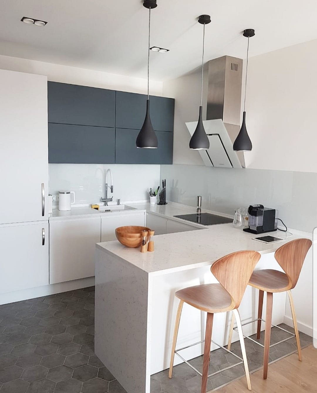 20. Contemporary White Kitchen with Dark Accents - small white kitchen ideas