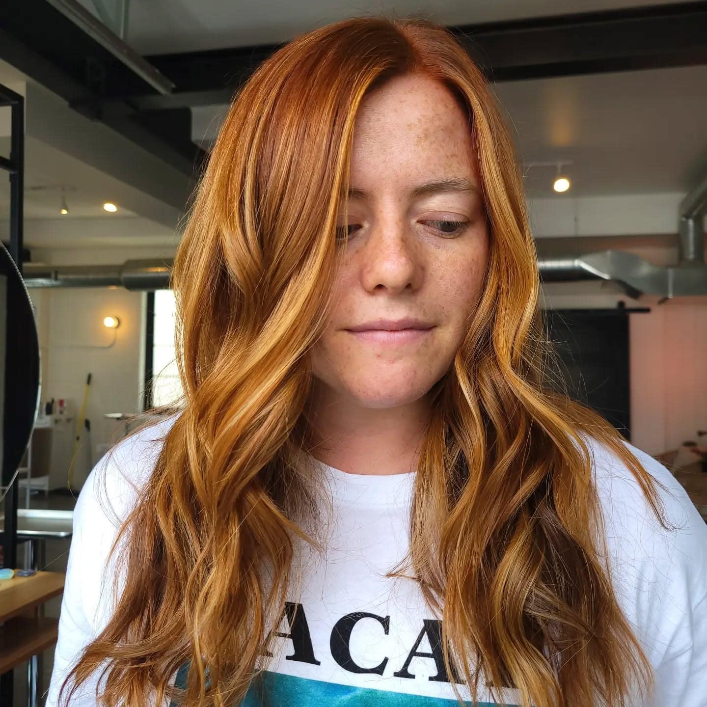 4. Soft Tangerine Flow - Redhead Hair with Highlights