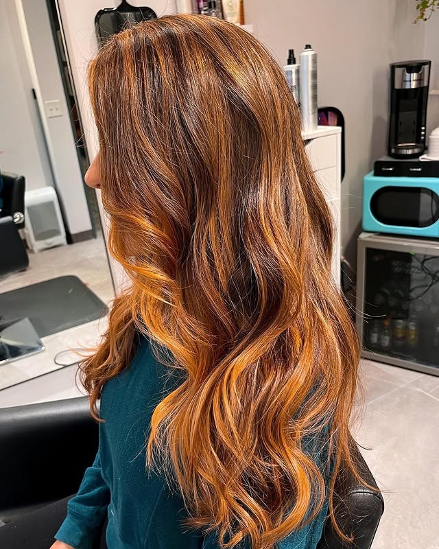 6. Cinnamon Gold Highlights - Redhead Hair with Highlights
