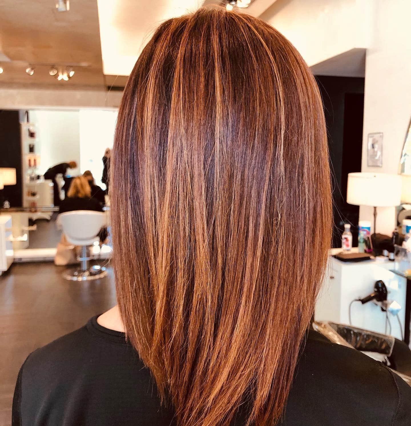 9. Toffee Auburn Sleek Cut - Redhead Hair with Highlights