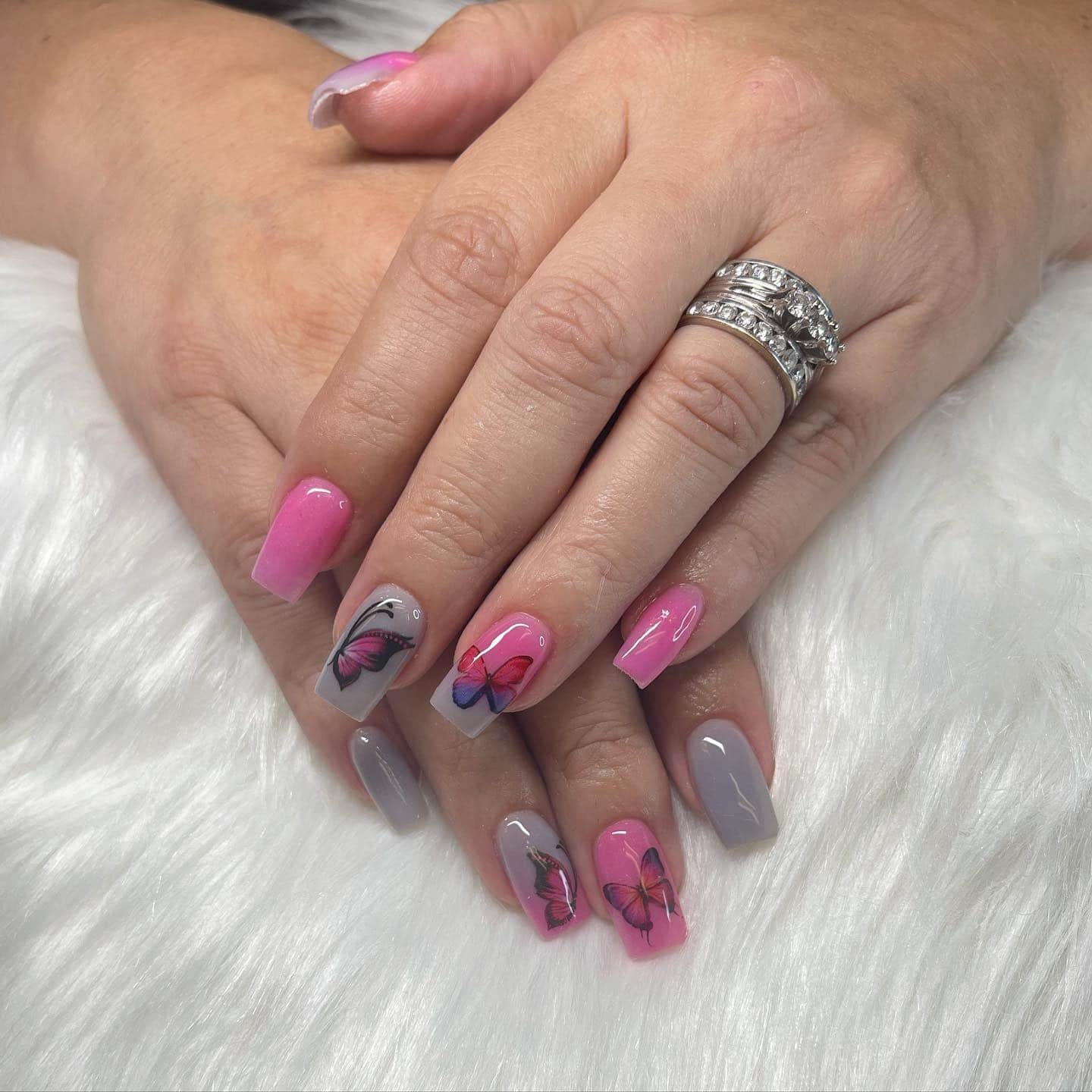 2. Butterfly Ombre Elegance - pink and gray nail ideas