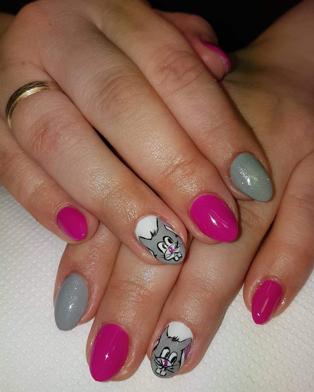 4. Playful Pink and Cartoon Charm - pink and gray nail ideas