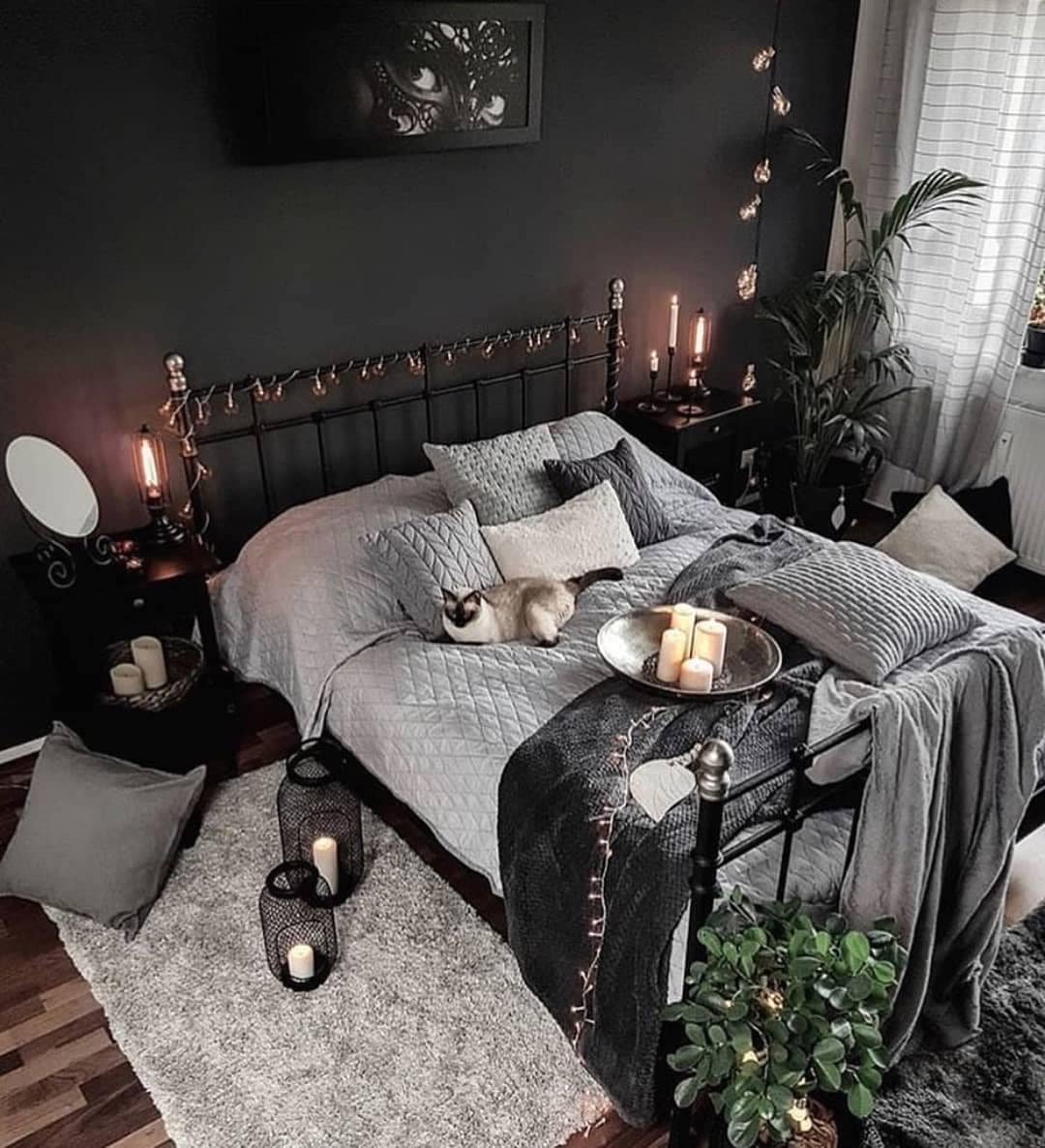 2. Moody Comfort with Candlelit Warmth - dark gray bedroom ideas