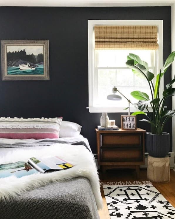 20. Mid-Century Mood with Natural Warmth - dark gray bedroom ideas