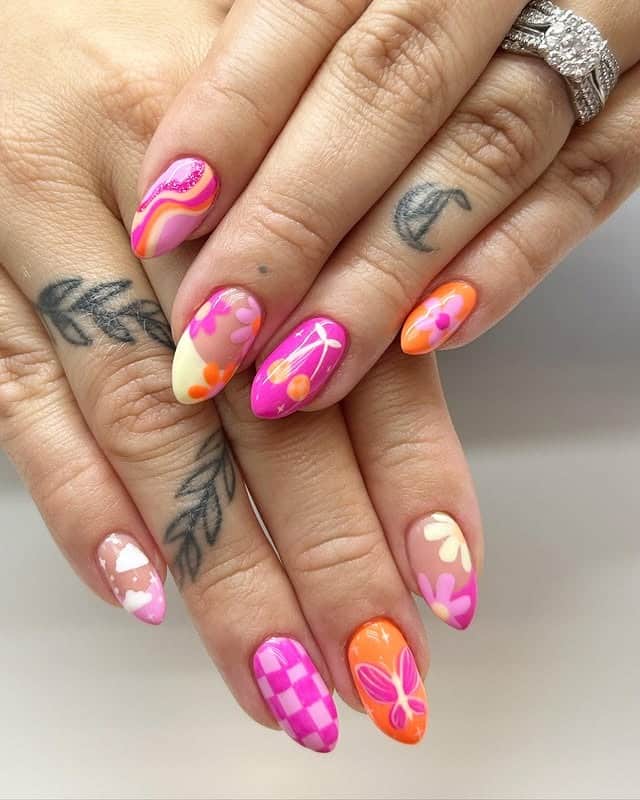 7. Playful Floral Fusion Nails - pink and orange nail ideas