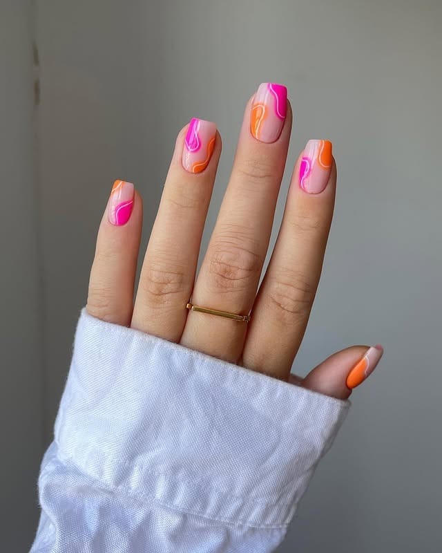 13. Contemporary Neon Wave Nails - pink and orange nail ideas